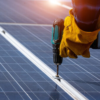 Engineer construction electric system at solar panel field. Electrical engineer construction electric system at solar panel field.