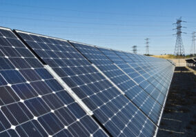 Solar panels feed utility lines at a location in the San Francisco Bay Area.