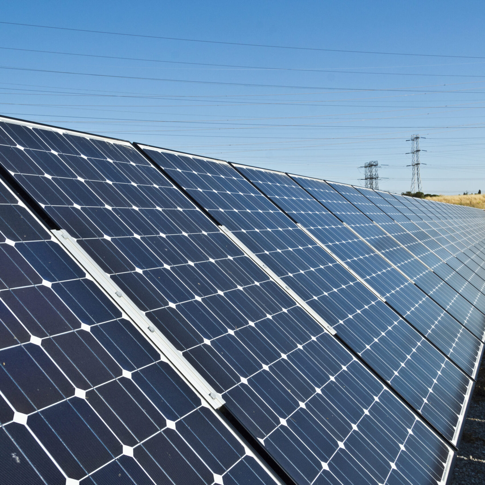 Solar panels feed utility lines at a location in the San Francisco Bay Area.